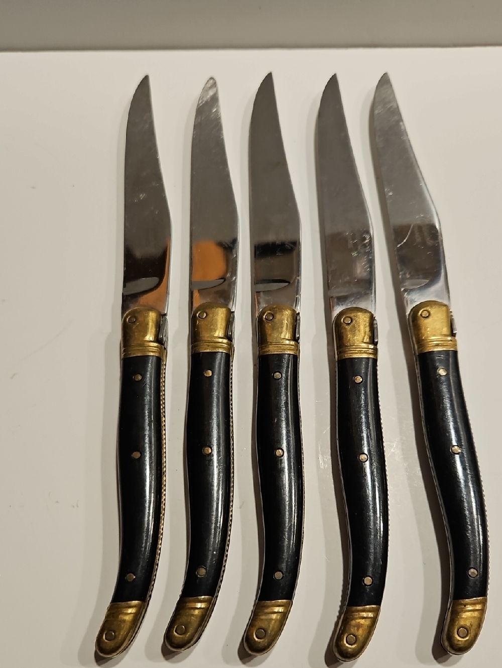 LAGUIOLE JEAN DUBOST FRANCE STEAK KNIVES  BLACK HANDLE WITH BRASS ENDS SET OF 5